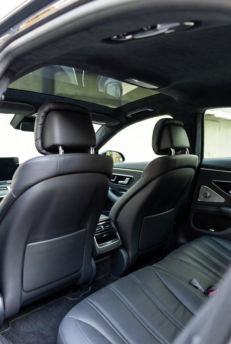 Luxury car at grand entrance