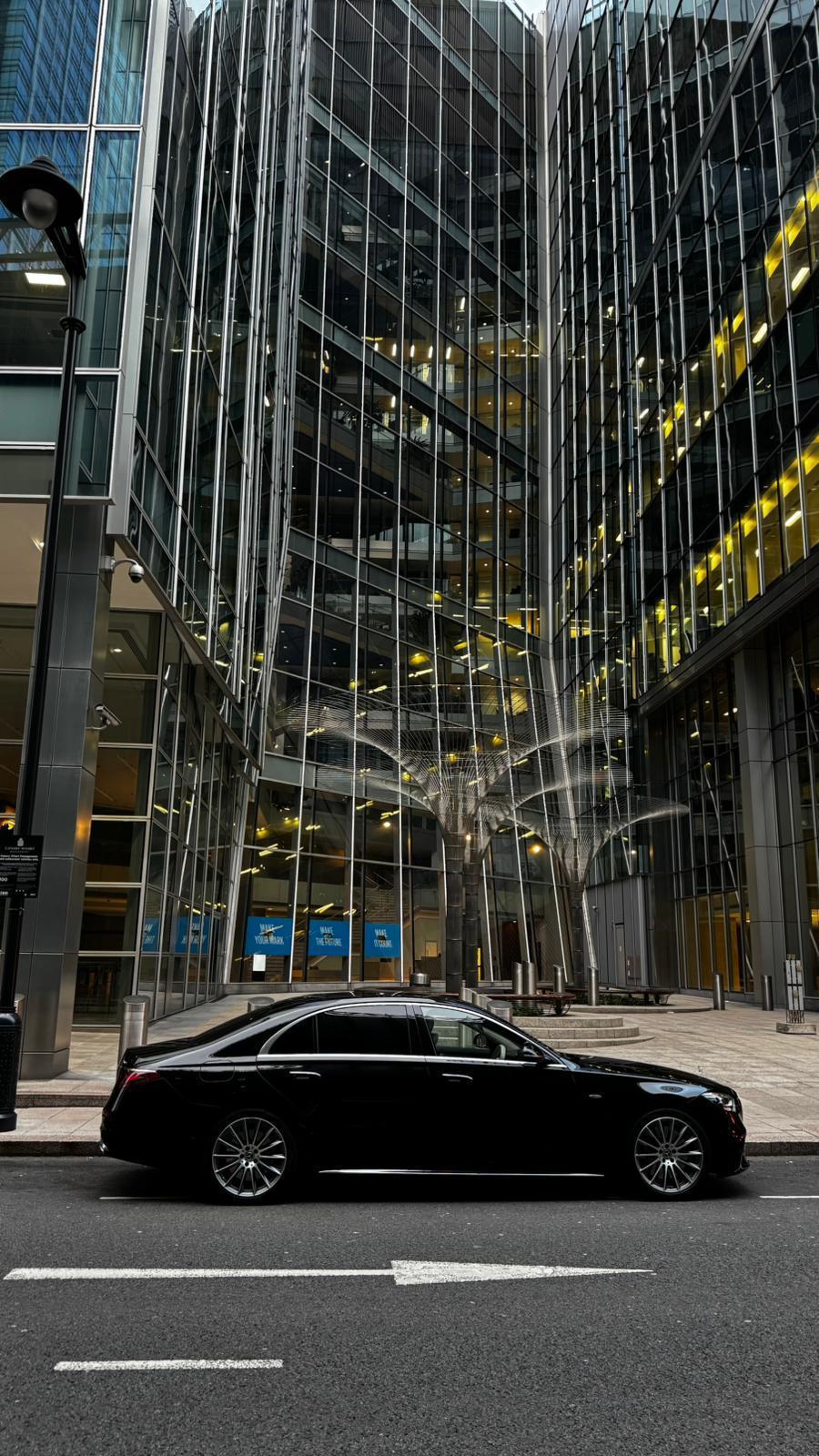 Luxury car at grand entrance